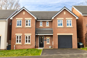 Front elevation and parking - click for photo gallery